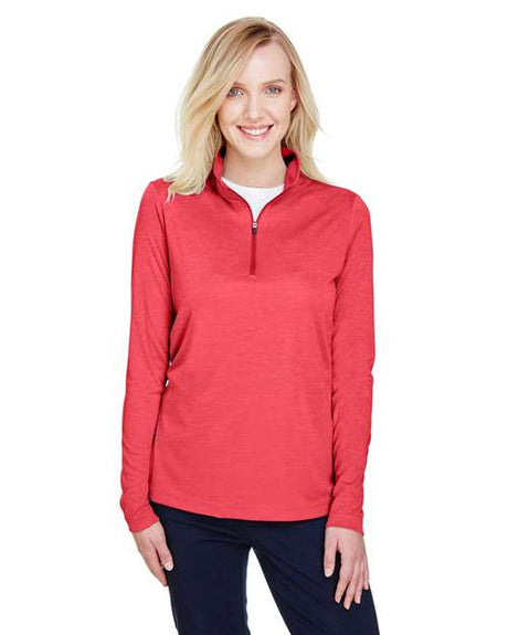 Team 365 Women’s Zone Sonic Heather performance quarter-zip pullover with a lightweight, athletic fit and heathered texture. Features moisture-wicking fabric and a zip-up collar, perfect for layering during workouts or casual wear.