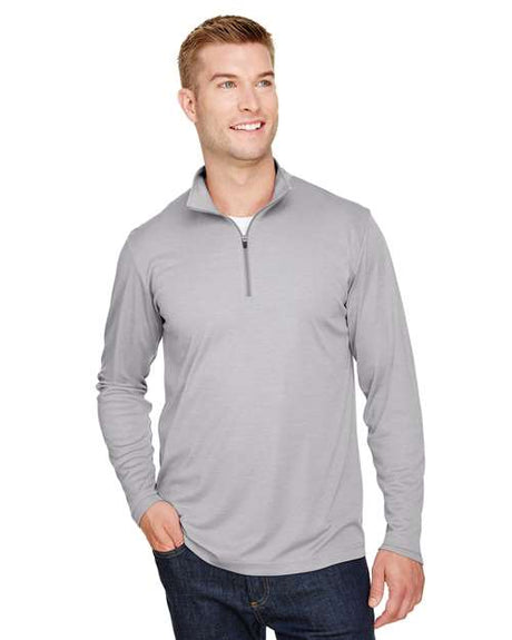 Team 365 Men’s Zone Sonic Heather performance quarter-zip pullover with a lightweight, breathable design and modern heathered look. Features moisture-wicking fabric and a zip-up collar, ideal for layering during workouts or everyday wear.