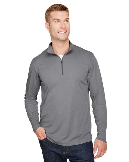 Team 365 Men’s Zone Sonic Heather performance quarter-zip pullover with a lightweight, breathable design and modern heathered look. Features moisture-wicking fabric and a zip-up collar, ideal for layering during workouts or everyday wear.