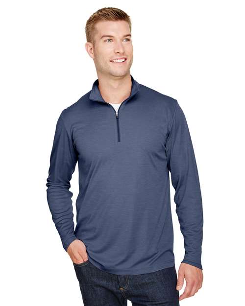 Team 365 Men’s Zone Sonic Heather performance quarter-zip pullover with a lightweight, breathable design and modern heathered look. Features moisture-wicking fabric and a zip-up collar, ideal for layering during workouts or everyday wear.