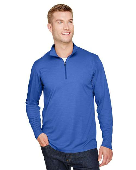 Team 365 Men’s Zone Sonic Heather performance quarter-zip pullover with a lightweight, breathable design and modern heathered look. Features moisture-wicking fabric and a zip-up collar, ideal for layering during workouts or everyday wear.