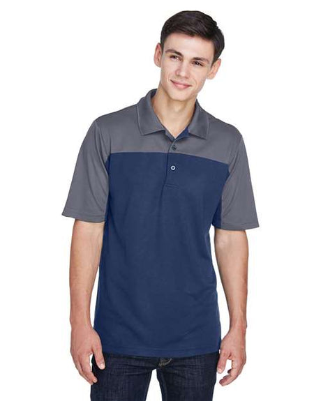 CORE365 Men’s Balance colorblock performance piqué polo with a modern athletic fit and contrasting panel design. Features moisture-wicking fabric and a classic collar, ideal for active or professional wear.