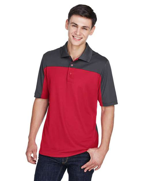 CORE365 Men’s Balance colorblock performance piqué polo with a modern athletic fit and contrasting panel design. Features moisture-wicking fabric and a classic collar, ideal for active or professional wear.