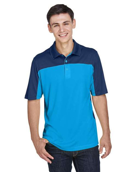 CORE365 Men’s Balance colorblock performance piqué polo with a modern athletic fit and contrasting panel design. Features moisture-wicking fabric and a classic collar, ideal for active or professional wear.