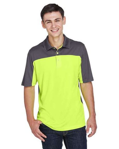 CORE365 Men’s Balance colorblock performance piqué polo with a modern athletic fit and contrasting panel design. Features moisture-wicking fabric and a classic collar, ideal for active or professional wear.