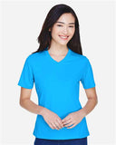 Team 365 Women’s Zone Performance t-shirt with a lightweight, breathable design and flattering athletic fit. Features moisture-wicking fabric, ideal for workouts or everyday active wear.