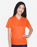 Team 365 Women’s Zone Performance t-shirt with a lightweight, breathable design and flattering athletic fit. Features moisture-wicking fabric, ideal for workouts or everyday active wear.