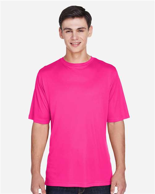 Team 365 Men’s Zone Performance t-shirt with a lightweight, breathable design and athletic fit. Features moisture-wicking fabric, ideal for workouts, sports, or everyday wear.