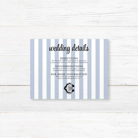 Wedding detail card with vertical blue and white stripes and black monogram crest, used to share venue directions, hotel info, dress code, or other event details.
