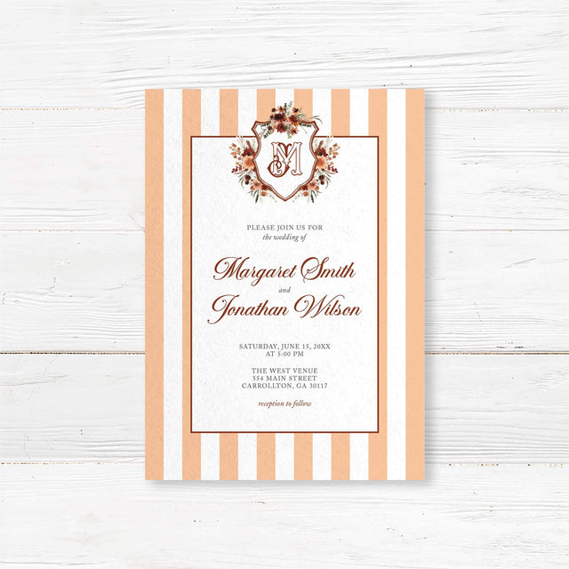 Autumn wedding invitation with floral crest monogram, terracotta and peach vertical stripes, classic script and serif fonts, and a white background for a rustic elegant wedding.