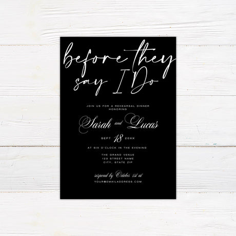 Black and white rehearsal dinner invitation with elegant script text reading "Before They Say I Do." The design features a modern and sophisticated layout with classic typography. Event details, including date, time, and location, are displayed in a stylish mix of script and serif fonts. The black background contrasts beautifully with the white lettering, creating a chic and timeless look. Perfect for setting the tone for a formal pre-wedding celebration.