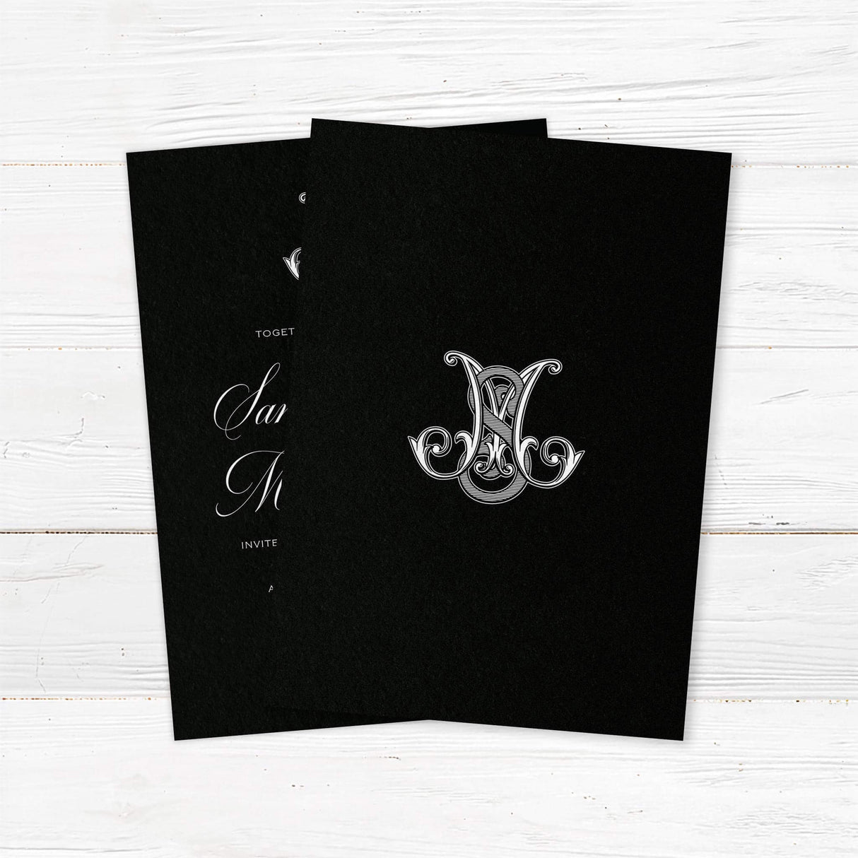 Wedding invitation with ornate Celtic-style monogram, white script and sans serif fonts, and a dramatic black background designed for formal, black-tie, or Celtic-inspired weddings. - back side