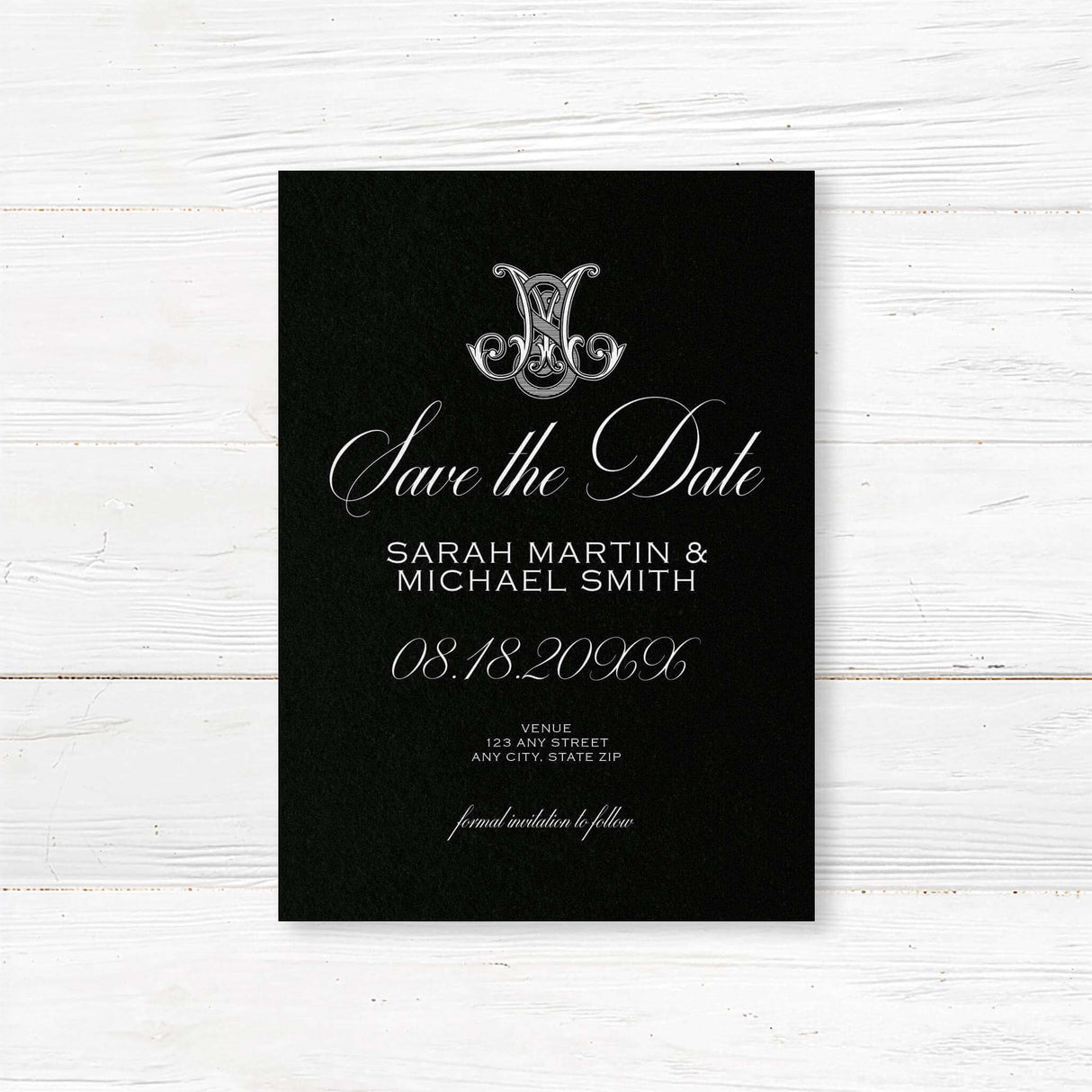 Save the Date card with black background, ornate Celtic monogram crest, white serif and script fonts. Matches the elegant and formal Black Delicate Celtic Monogram suite.
