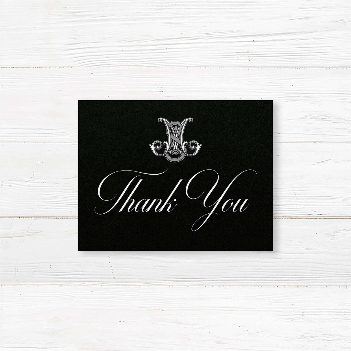 Thank you card with dramatic black background, ornate Celtic monogram, and white script and serif fonts. Coordinates with the Black Delicate Celtic Monogram wedding suite.