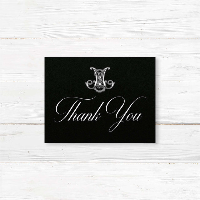 Thank you card with dramatic black background, ornate Celtic monogram, and white script and serif fonts. Coordinates with the Black Delicate Celtic Monogram wedding suite.