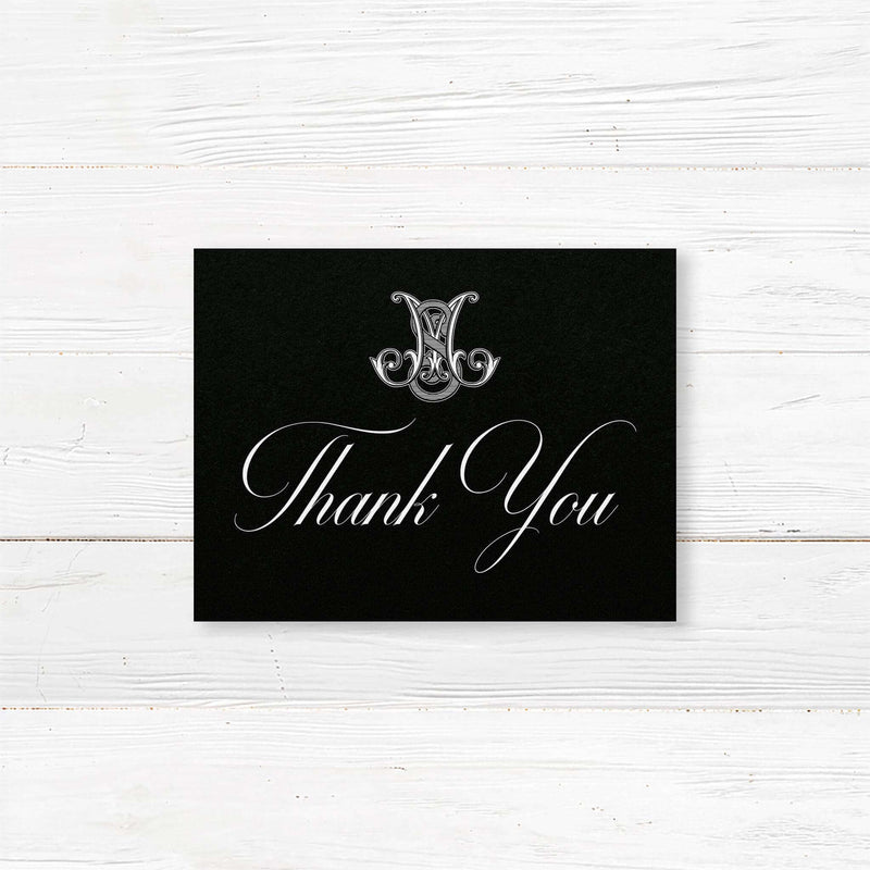 Thank you card with dramatic black background, ornate Celtic monogram, and white script and serif fonts. Coordinates with the Black Delicate Celtic Monogram wedding suite.