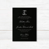 Wedding invitation with a black background, ornate Celtic monogram, and a blend of white script and serif fonts. A dramatic and elegant choice for formal or Celtic-inspired weddings.