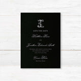 Save the Date card featuring a black background, ornate Celtic monogram crest, and elegant white serif and script fonts for formal and black-tie wedding themes.