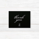 Wedding thank you card with a black background, white script and serif fonts, and elegant layout to match the formal Black Script Celtic Monogram wedding stationery suite.