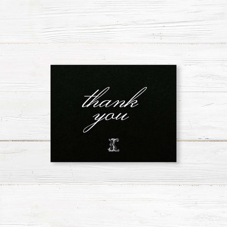 Wedding thank you card with a black background, white script and serif fonts, and elegant layout to match the formal Black Script Celtic Monogram wedding stationery suite.