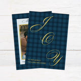 Blue plaid Christmas photo card featuring a family photograph with elegant script, gold accents, and personalized family text. The coordinating back features large gold JOY lettering with a faith-inspired Christmas message. - back.