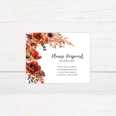 A wedding rsvp with a background featuring stunning watercolor floral arrangement in warm autumn tones of red, orange, and brown. The text is elegantly arranged in a mix of script and serif fonts, creating a sophisticated yet modern feel. Event details, including the date, time, and venue, are clearly displayed in a balanced layout. This design exudes warmth and romance, perfect for a fall, rustic, or boho-themed wedding celebration.