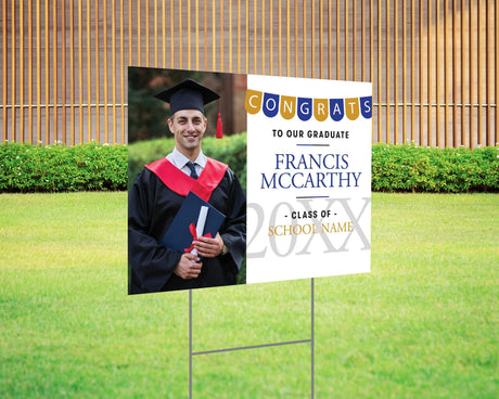 Custom graduation yard sign with photo featuring a Congrats banner in blue and gold, graduate's name, school name, and class year. Printed on durable Coreplast plastic, available in single or double-sided print, perfect for high school and college graduates.