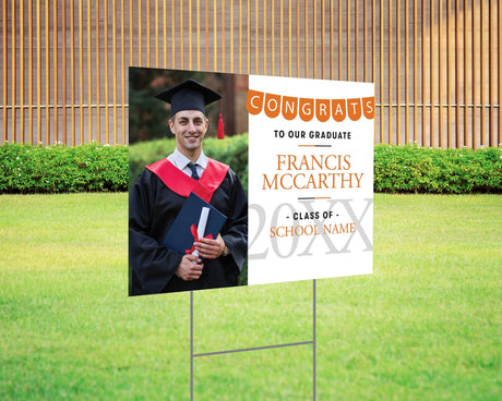 Custom graduation yard sign with photo featuring a Congrats banner in orange, graduate's name, school name, and class year. Printed on durable Coreplast plastic, available in single or double-sided print, perfect for high school and college graduates.