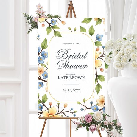 Bridal shower welcome sign featuring a gold geometric frame and watercolor floral accents in yellow and blue, printed on high-quality material for elegant event décor.