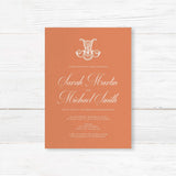 Terracotta wedding invitation with white calligraphy and ornate Celtic-style monogram
