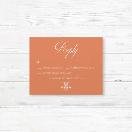 Terracotta RSVP card with white serif font for formal wedding response