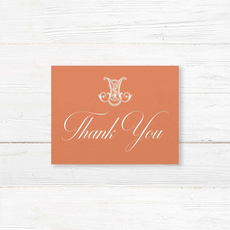 Terracotta thank you card with white fonts and Celtic-style monogram