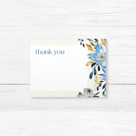 Bridal shower thank-you card featuring watercolor blue, gold, and ivory flowers, printed on premium cardstock for a floral-themed event.