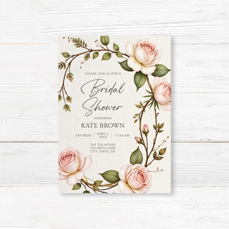 Romantic bridal shower invitation with soft blush roses and greenery in a vintage floral design, printed on premium cardstock.