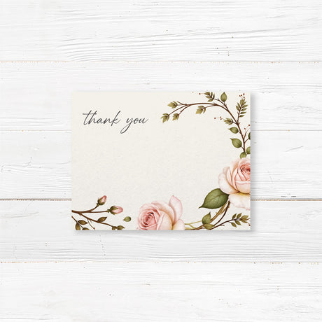 Elegant bridal shower thank-you card featuring soft blush roses and greenery, printed on premium cardstock for a vintage floral theme.