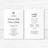 Elegant wedding ceremony program in black and white with monogram and formal fonts