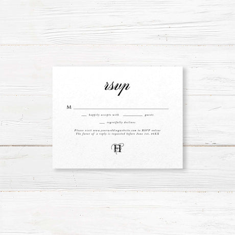 Classic black and white wedding RSVP card with elegant serif font and minimalist design