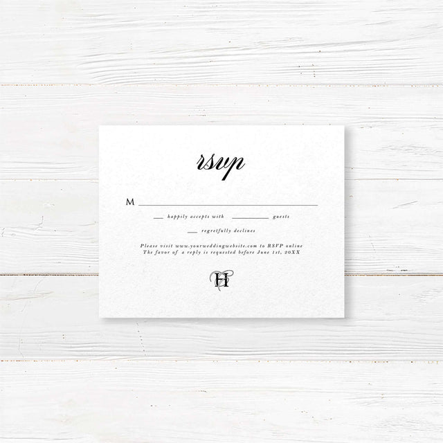 Classic black and white wedding RSVP card with elegant serif font and minimalist design