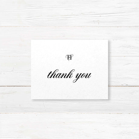 Elegant black and white thank you card with monogram and serif font for wedding gratitude