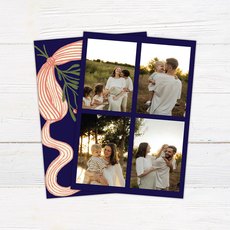 Personalized Christmas card featuring festive mistletoe, berries, striped ribbon, and a Merry Christmas greeting. The reverse features a four-photo family collage for sharing favorite memories. back
