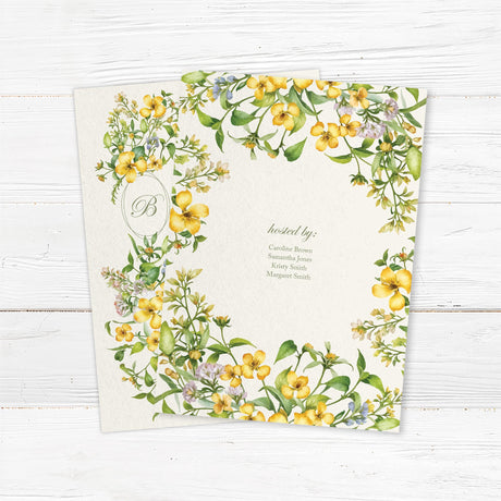 Elegant bridal shower invitation with a watercolor floral garland in yellow and green hues. Features customizable event details on premium cardstock. Back