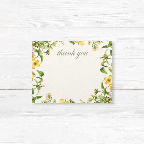 Bridal shower thank-you card with a watercolor floral garland in yellow and green, printed on premium cardstock.