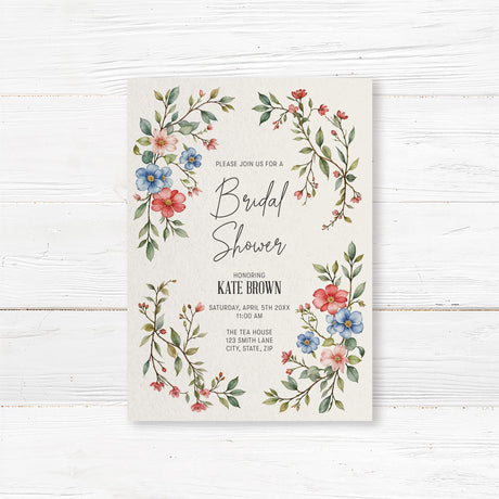 Elegant bridal shower invitation featuring red, blue, and blush watercolor flowers with greenery, printed on premium cardstock.