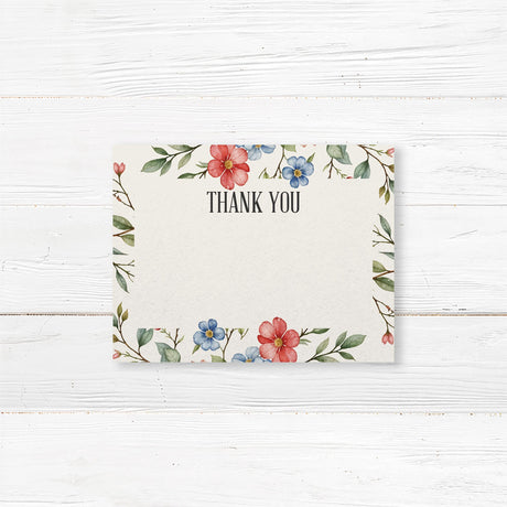 Bridal shower thank-you card featuring watercolor red, blue, and blush flowers with greenery, printed on premium cardstock for a floral-themed event.