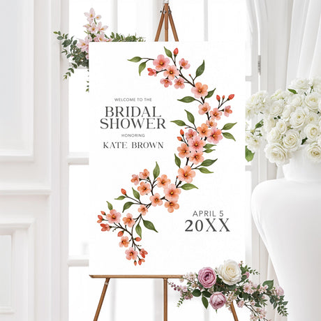 Bridal shower welcome sign featuring a watercolor cherry blossom vine with soft pink flowers and green leaves, printed on high-quality material for elegant event décor.