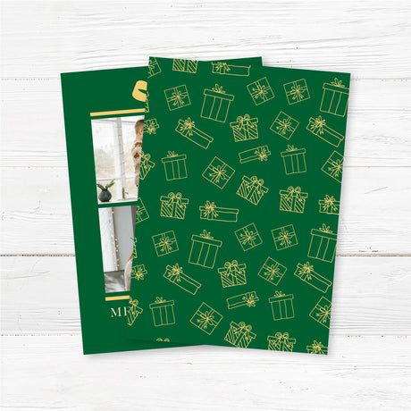 Gift Box Christmas card with green background, golden bow illustration, two family photo placements, and personalized holiday greeting text. - back.