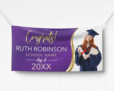 Elegant "Congrats!" Graduation Vinyl Banner featuring a bold gold-accented design, class year, and a celebratory graduation photo. Custom colors and school name available. purple and gold