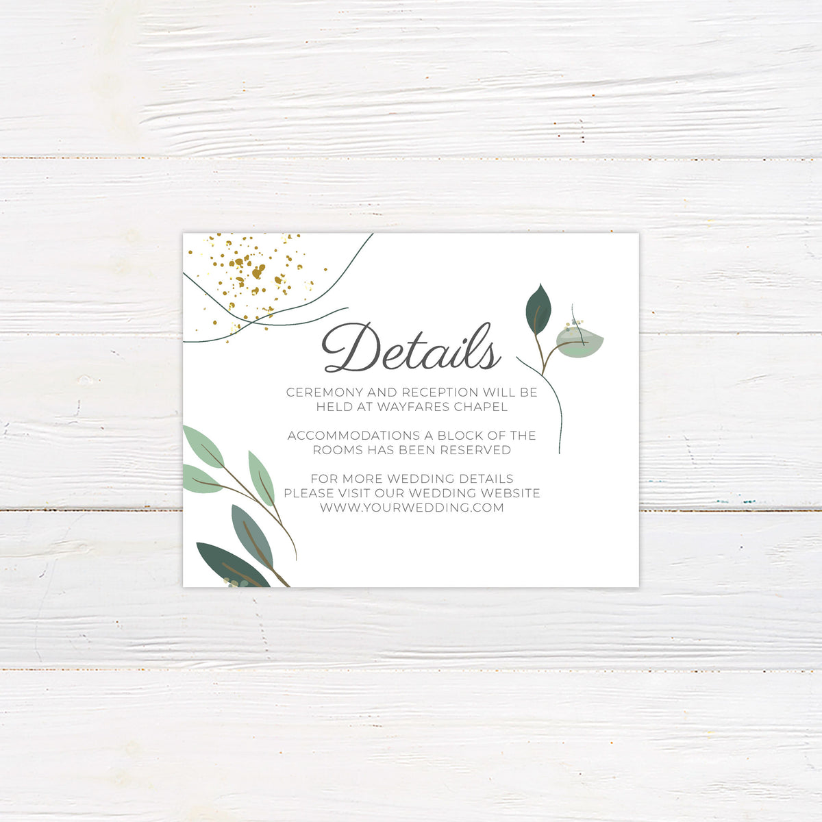 Gold flake greenery wedding details card with modern green botanical leaves, curved line accents, and decorative gold flakes. The card includes space for venue, accommodations, and wedding website information.