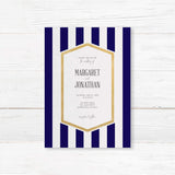 Wedding invitation with navy blue stripes, gold border, and modern white center panel with serif and handwritten fonts