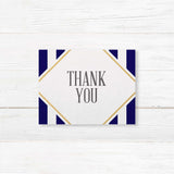 Thank you card with navy stripes, gold frame, and white center panel for handwritten notes